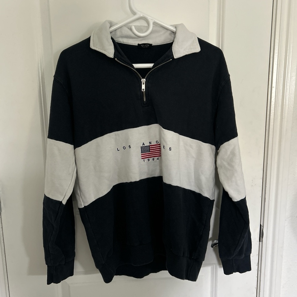 Women’s quarter zip up with flag